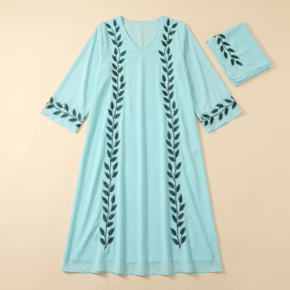 SITRĀ Amira Embroidered Abaya — Cyan flat lay