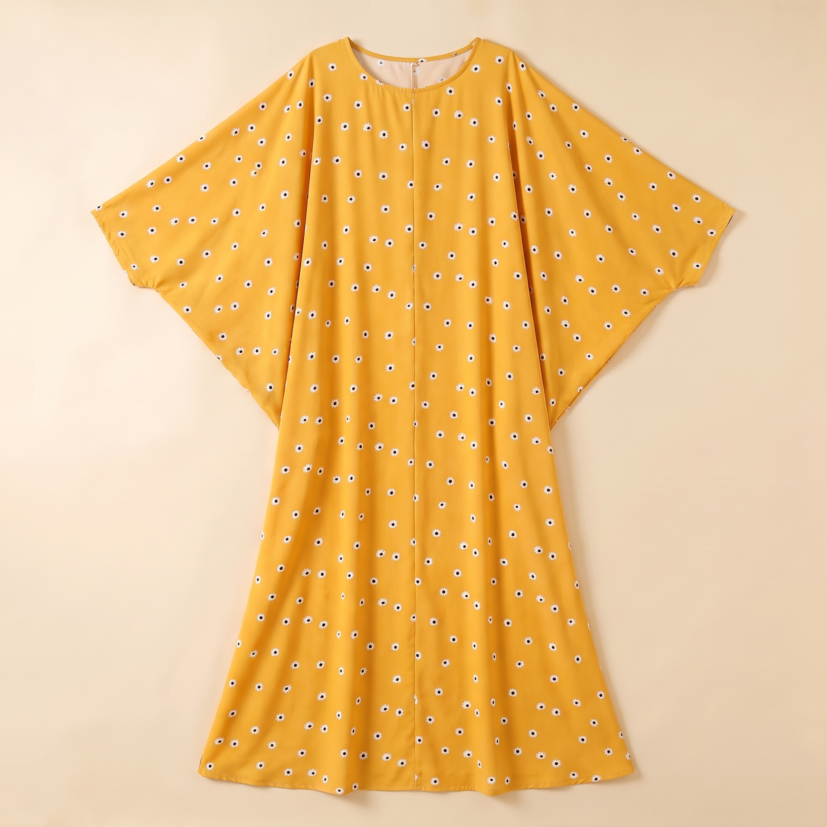 SITRĀ Batwing Sleeve Printed Maxi Abaya — Mustard Ditsy flat lay