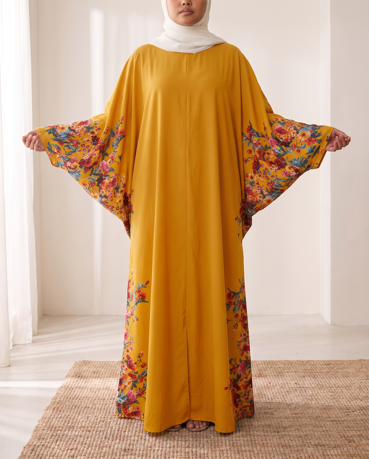 SITRĀ Batwing Sleeve Printed Maxi Abaya — Mustard Floral Border (model Leila)