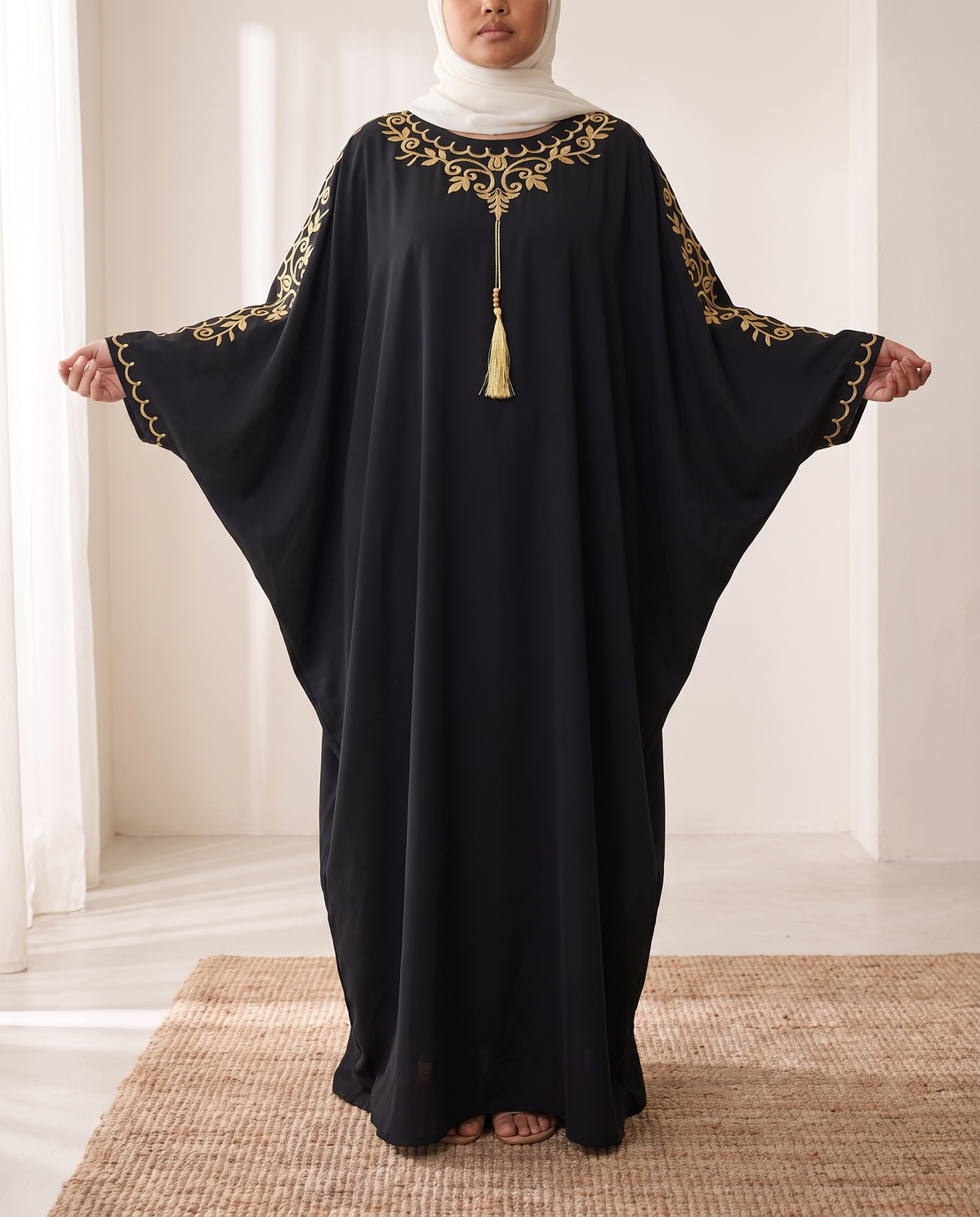 SITRĀ Batwing Sleeve Printed Maxi Abaya — Black Gold Embroidered (model Leila)