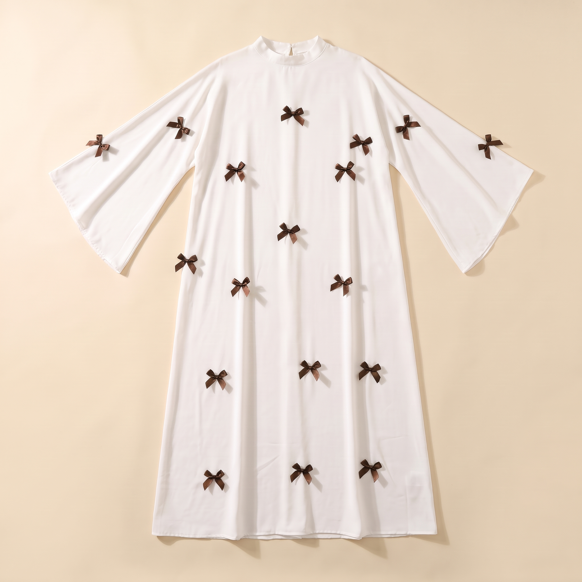 SITRĀ Bow-Detail Flared Sleeve Kaftan — Brown Bow flat lay