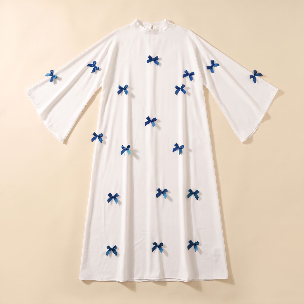 SITRĀ Bow-Detail Flared Sleeve Kaftan — Blue Bow flat lay