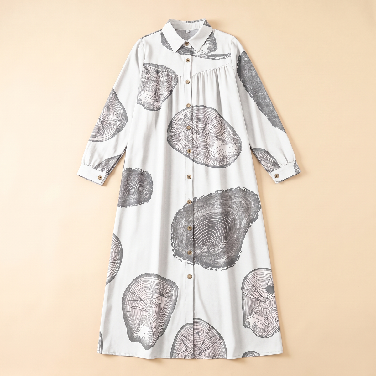 SITRĀ Button-Front Shirt Dress Abaya — White Circle Print flat lay
