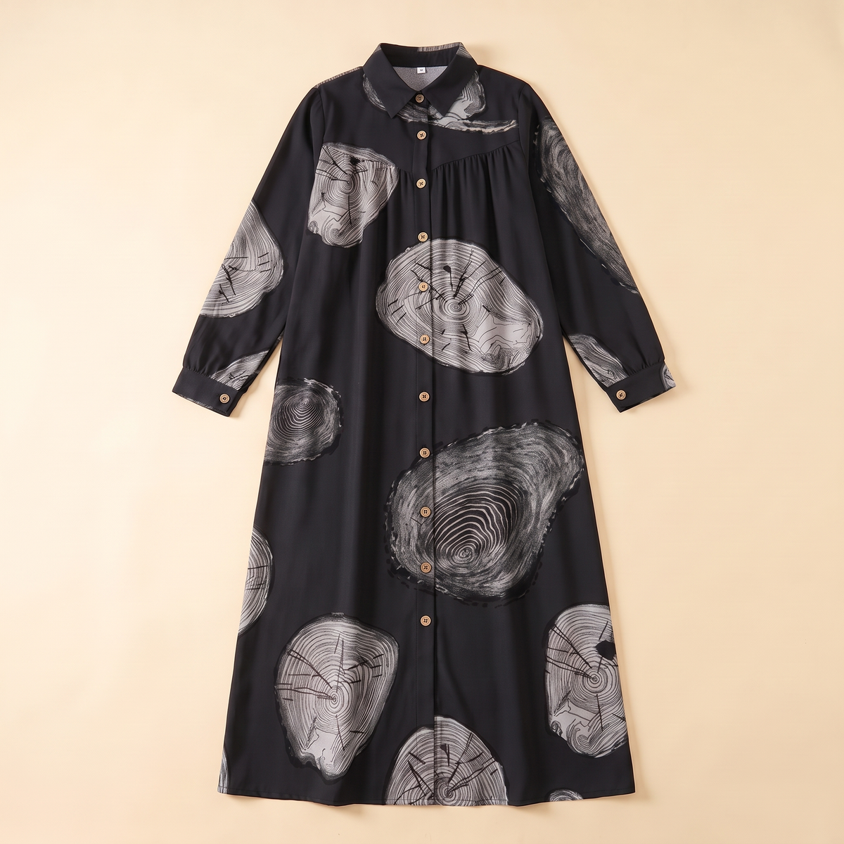 SITRĀ Button-Front Shirt Dress Abaya — Black Circle Print flat lay