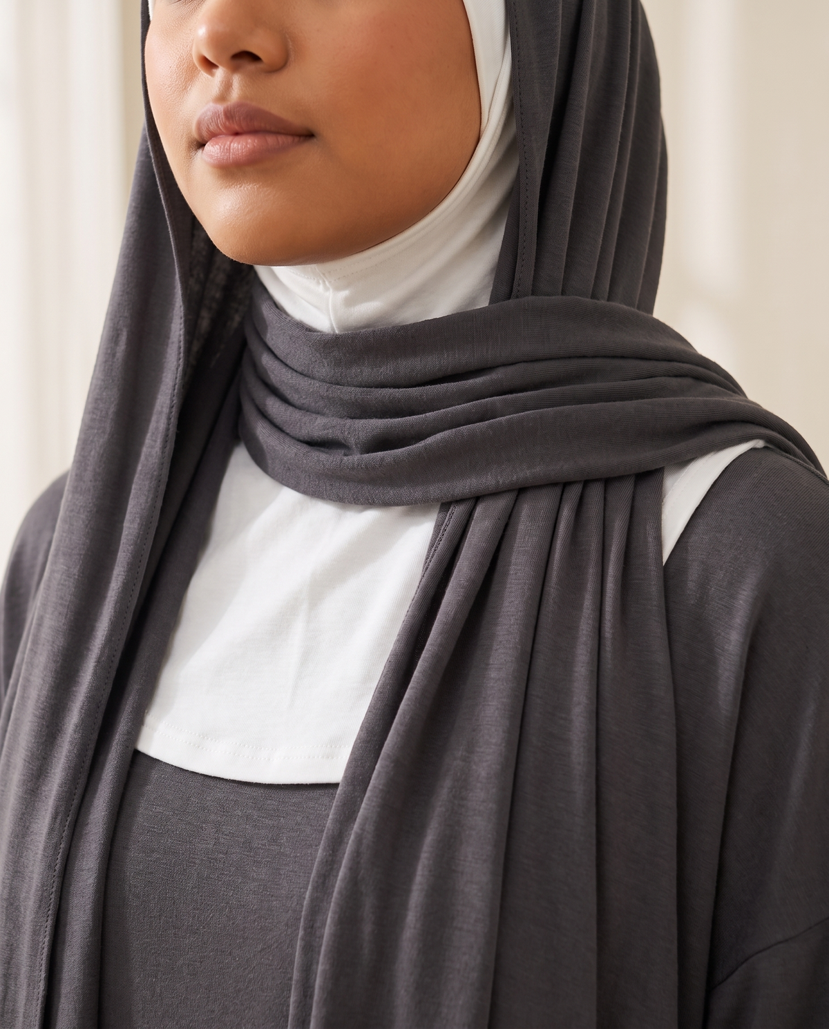 Detachable High-Neck Collar in White Hooded, worn