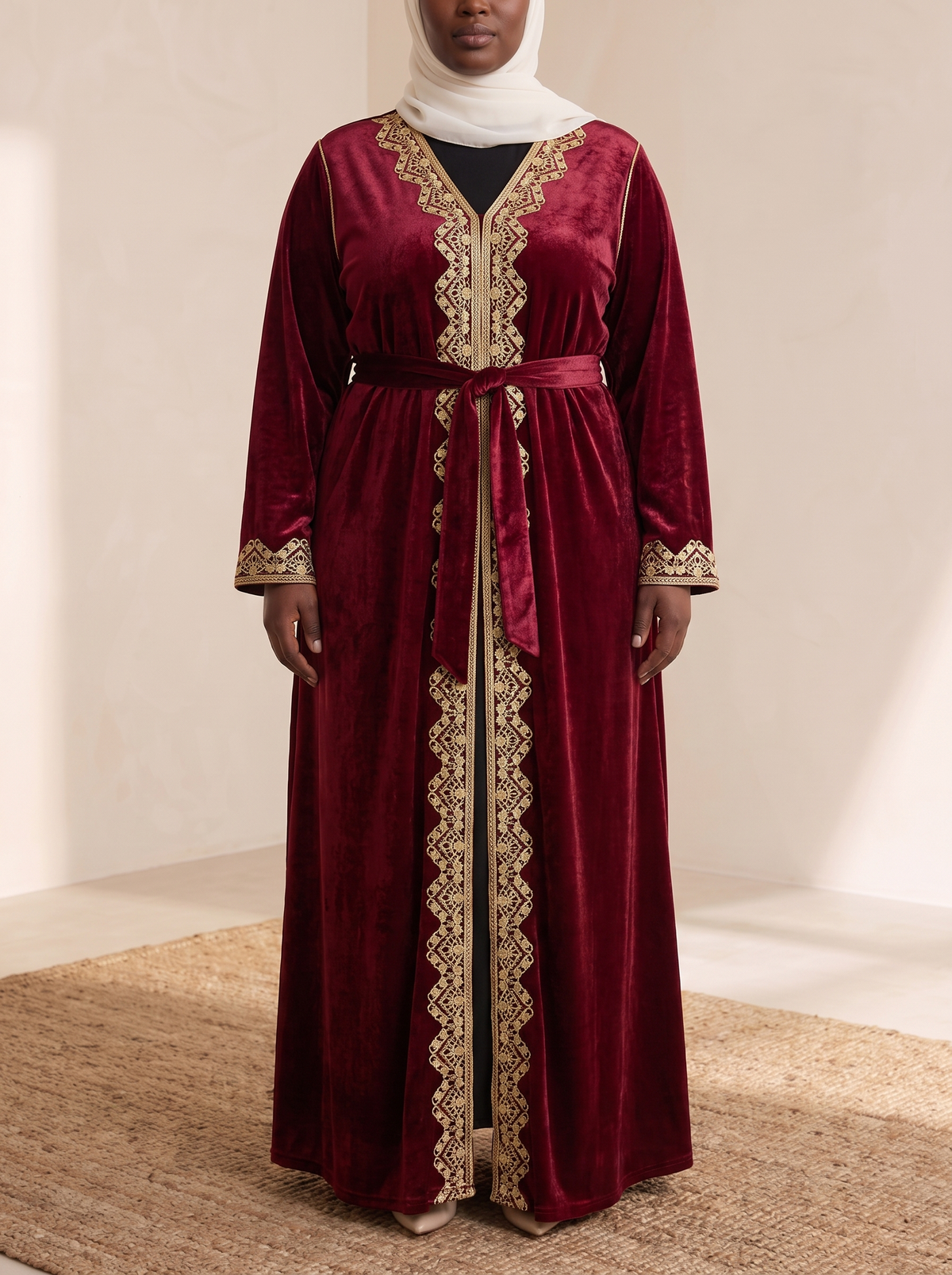 Farah Embroidered Velvet Abaya – Wine Red, on model