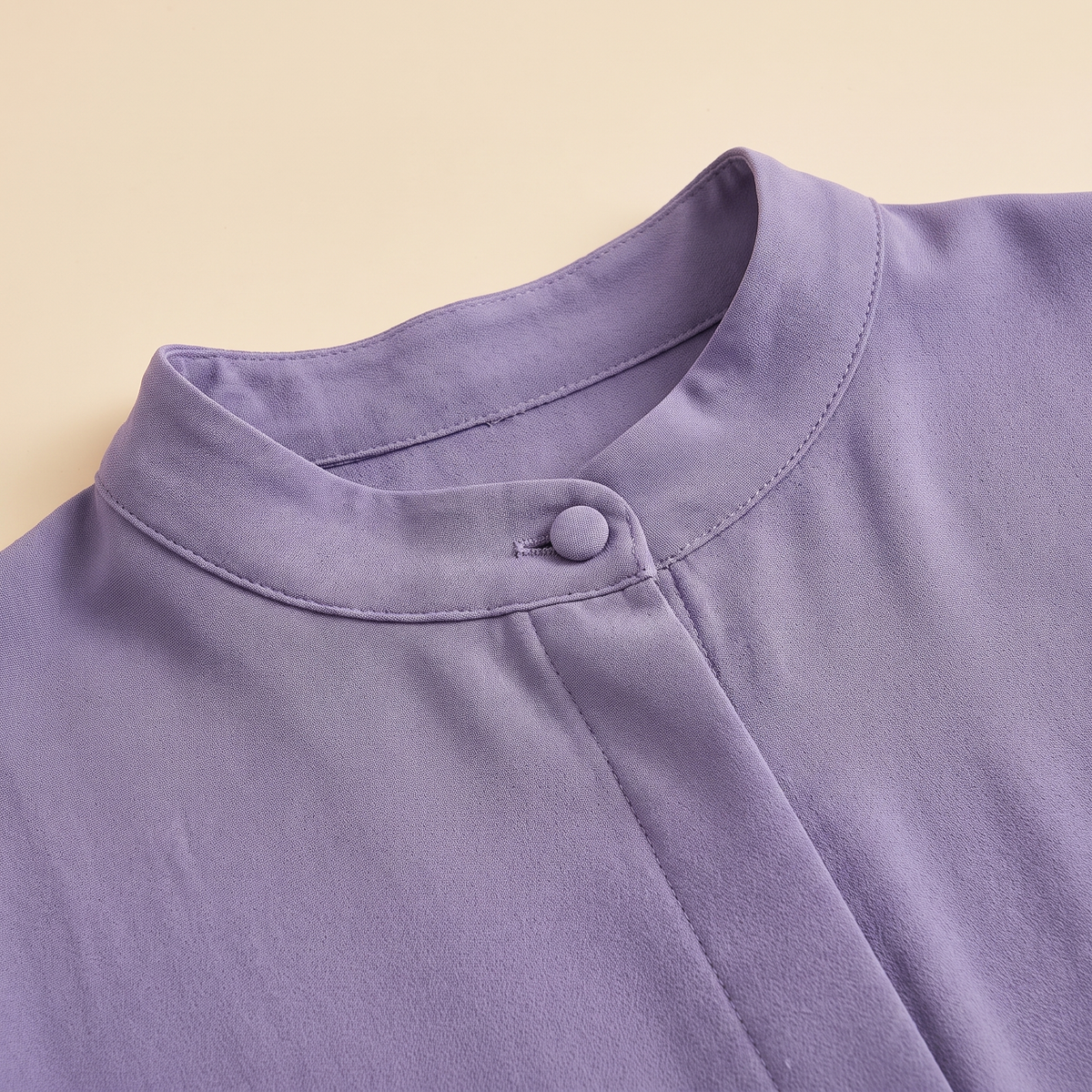 Reem kaftan — stand collar and button detail