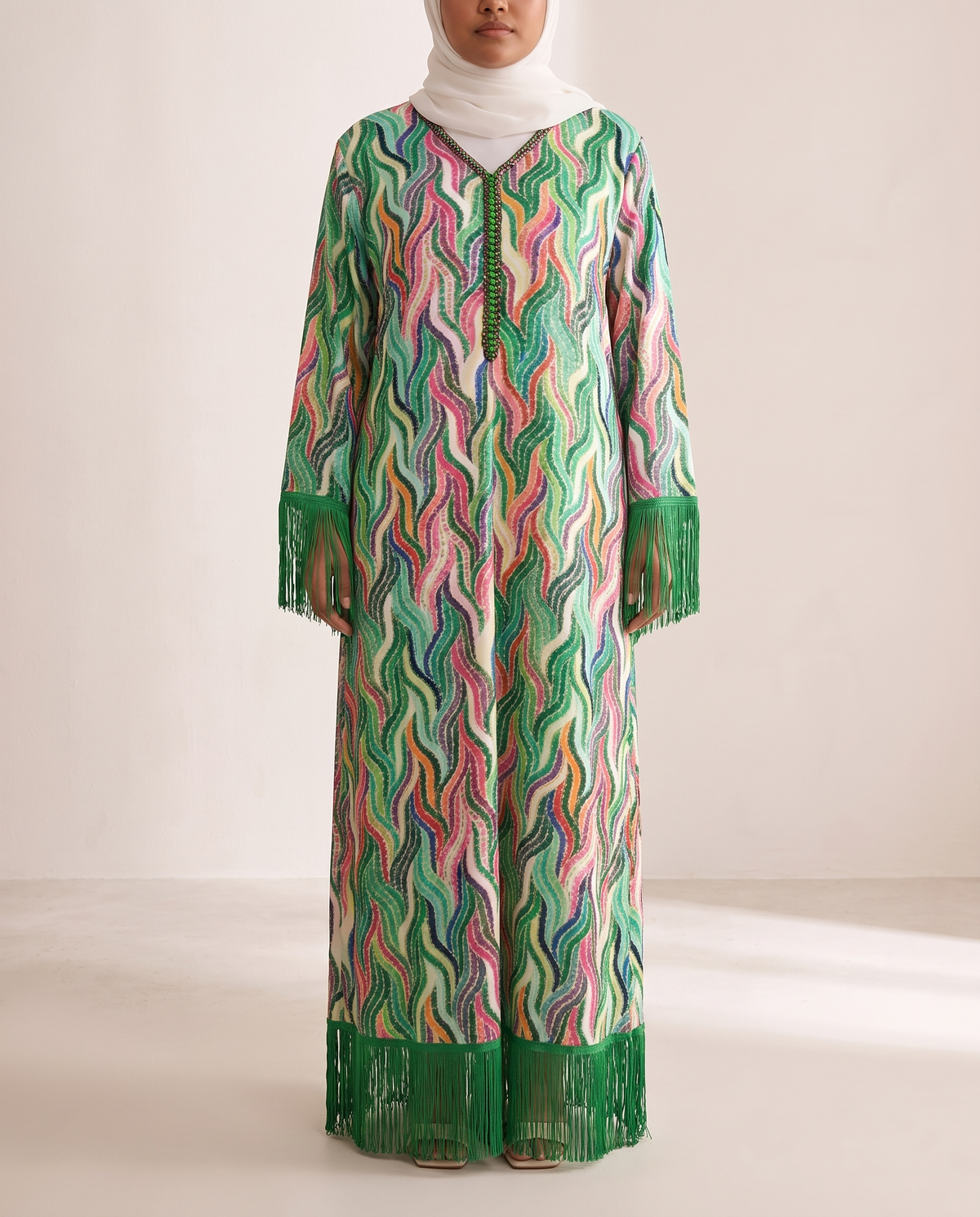 Shirin printed tassel-hem kaftan in Green Print, front