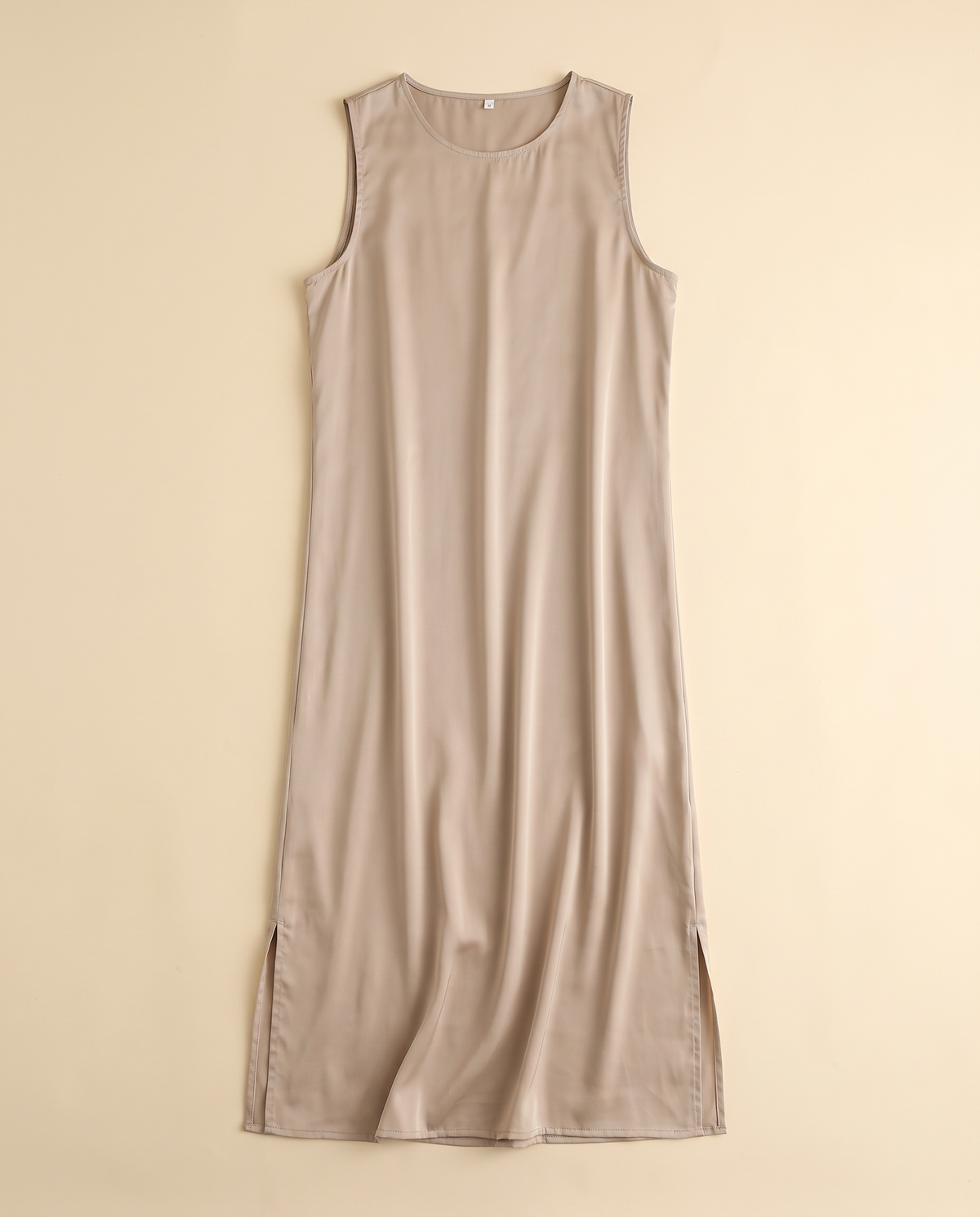 Sleeveless satin slip underdress in Beige, flat lay