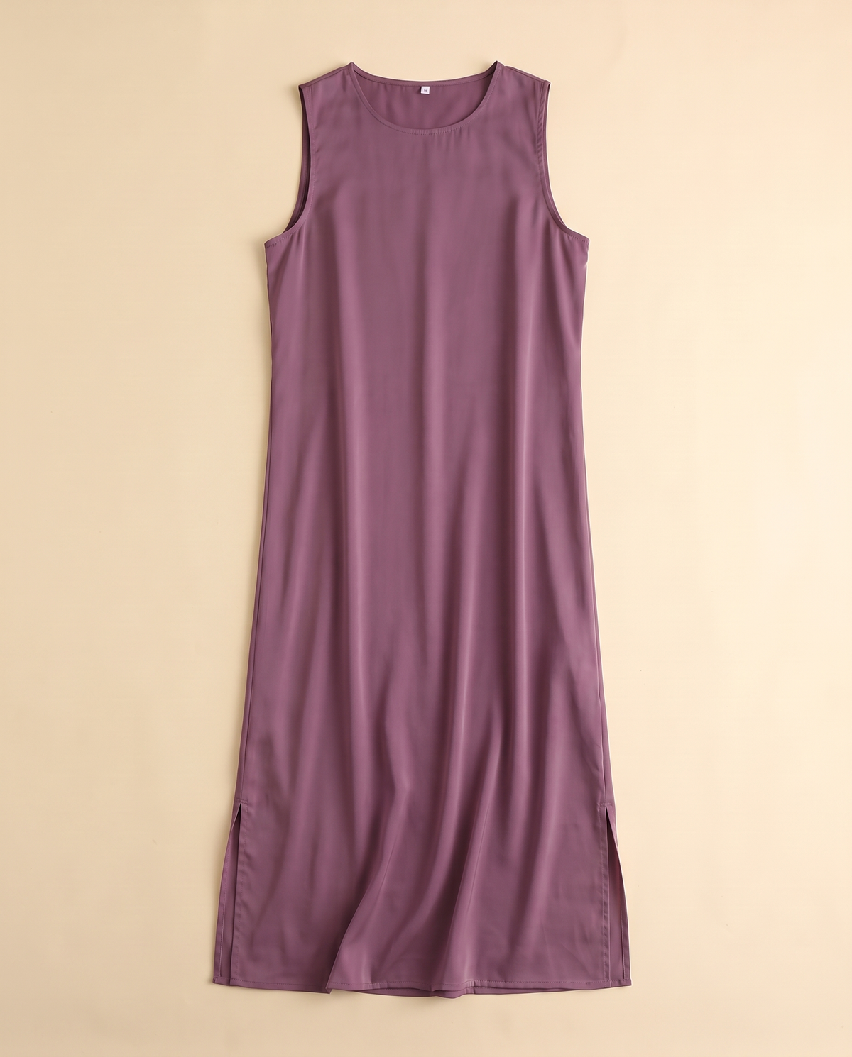 Sleeveless satin slip underdress in Mauve, flat lay