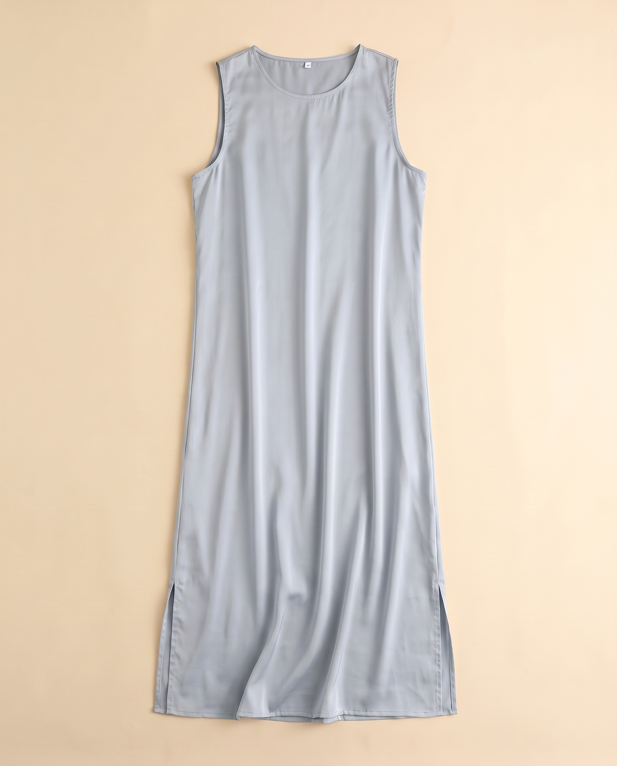 Sleeveless satin slip underdress in Ice Grey, flat lay