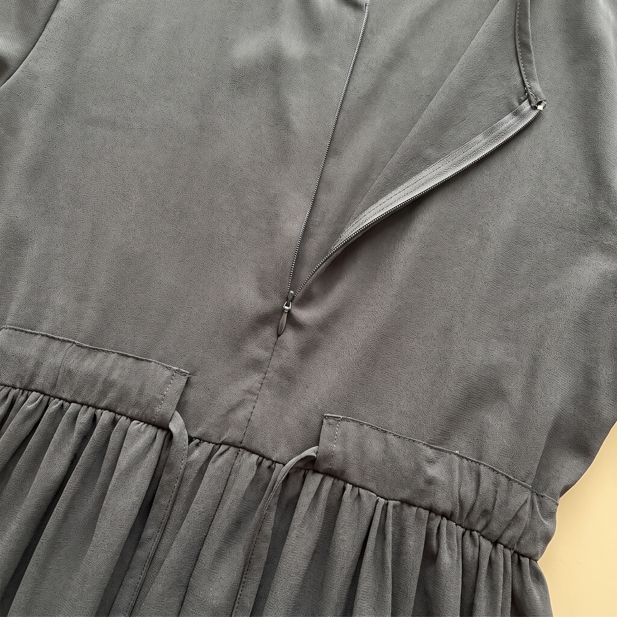 Zip-front swing abaya — zip and gathered waist detail