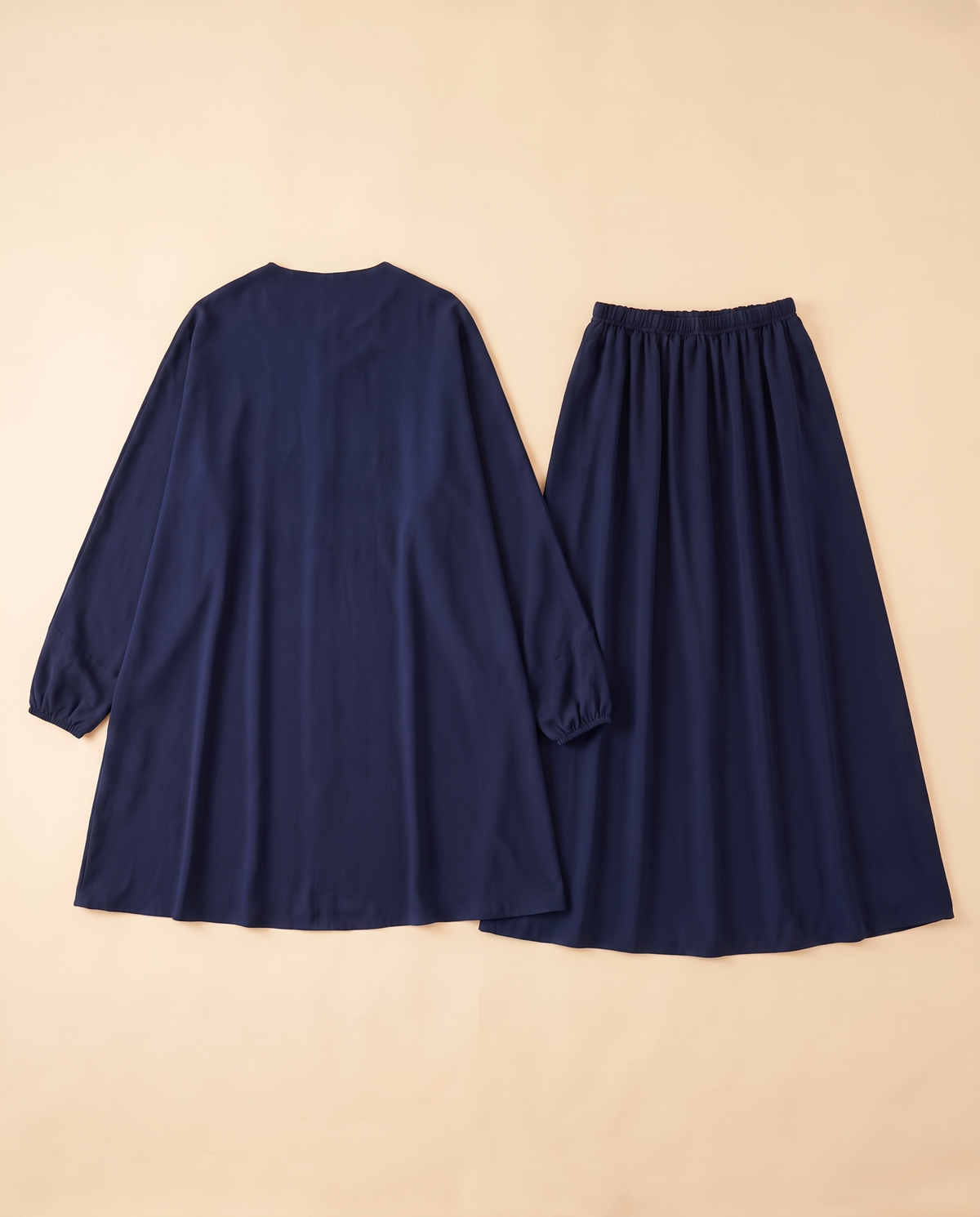 Two-piece khimar and skirt prayer set in Navy, flat lay