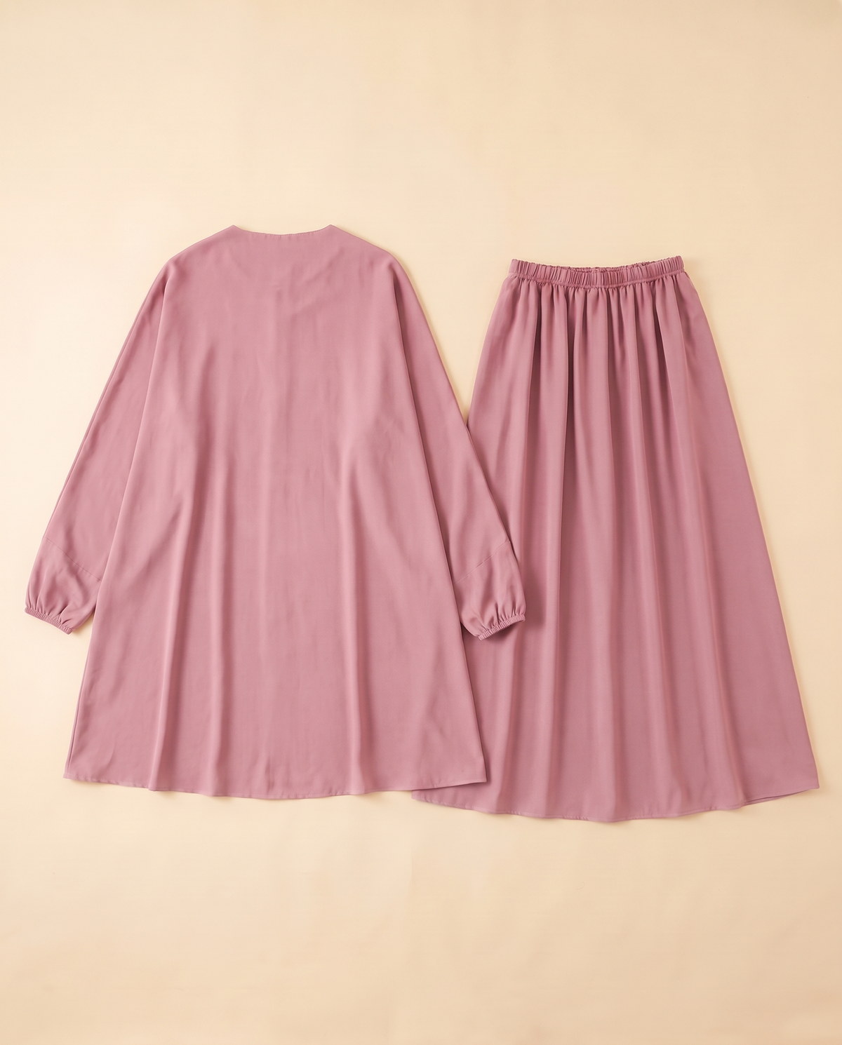 Two-piece khimar and skirt prayer set in Dusty Pink, flat lay
