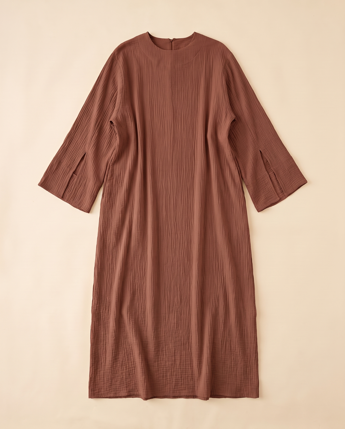 Wijdan textured split-sleeve abaya in Rust, flat lay