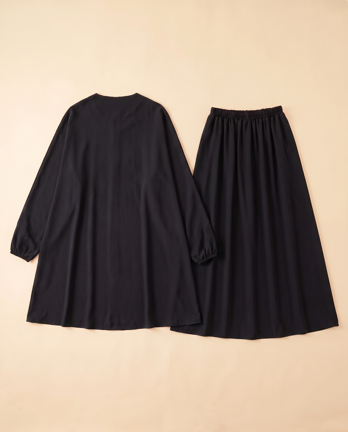 Two-piece khimar and skirt prayer set in Black, flat lay