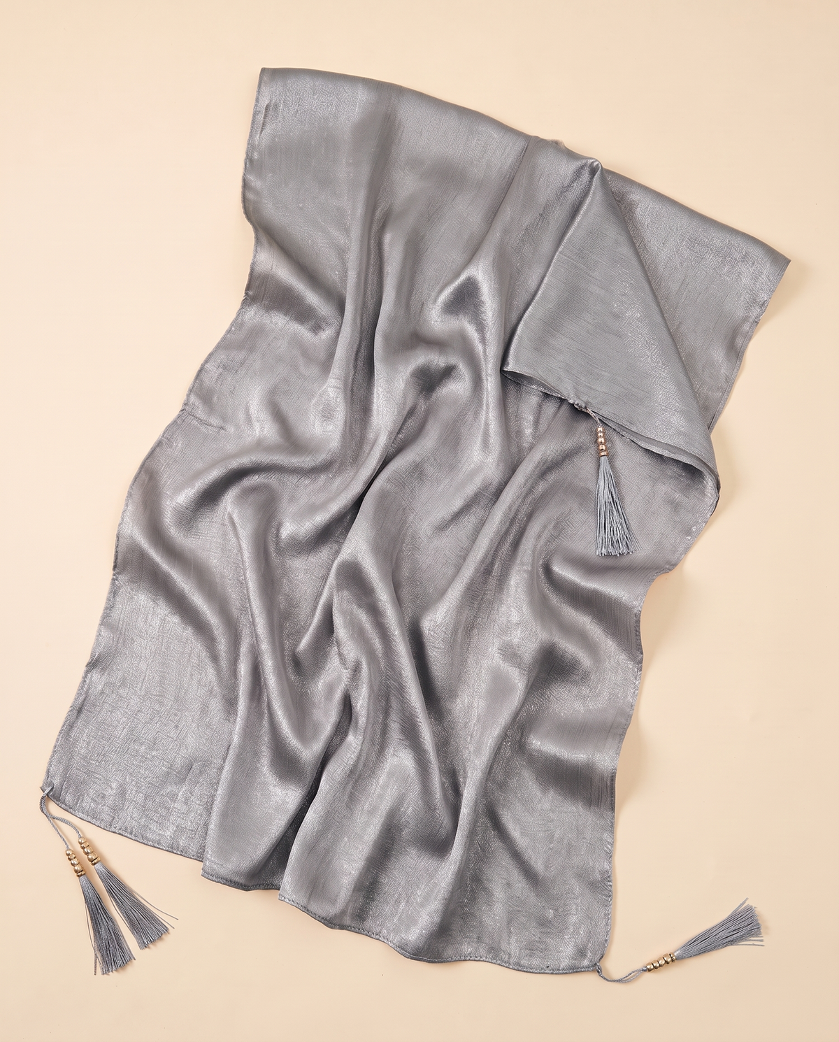 Yara tasseled shimmer shawl in Silver Grey, flat