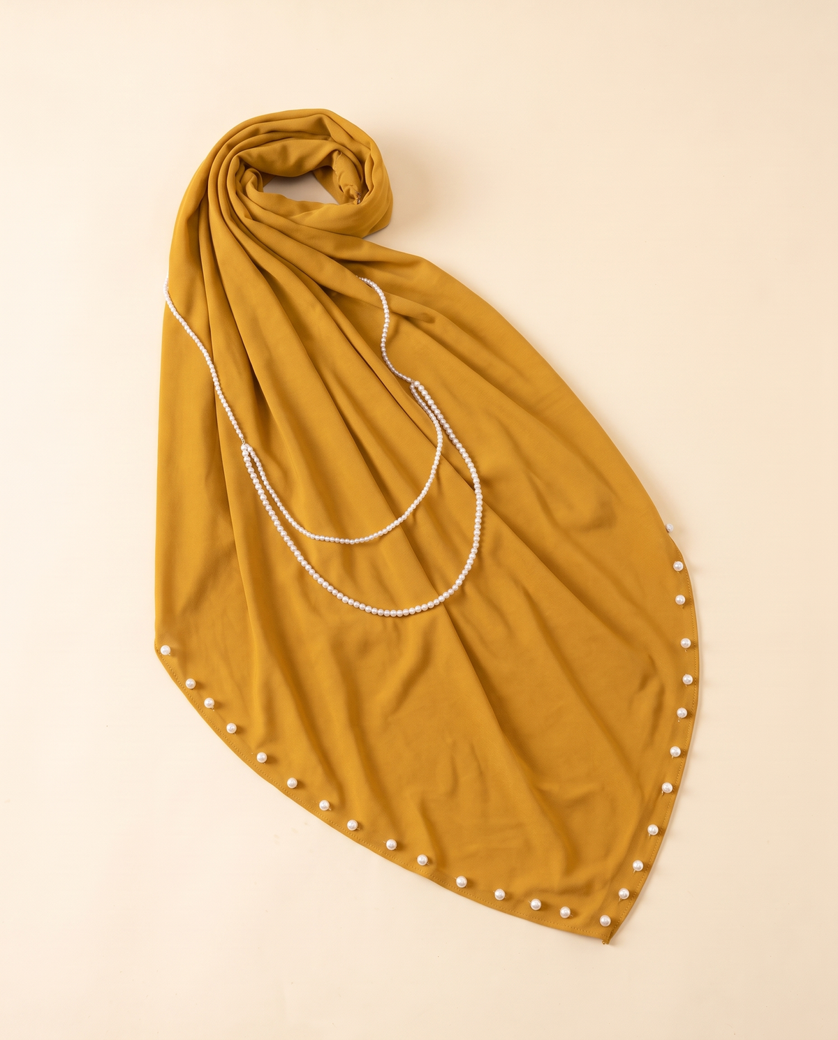 Zahia pearl-trim instant hijab in Mustard, flat