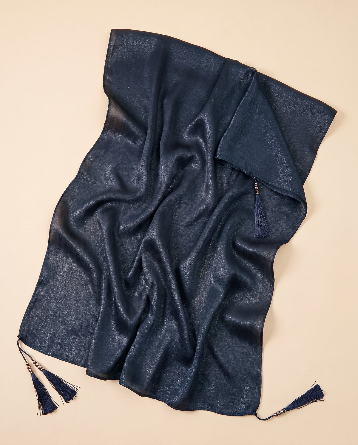 Yara tasseled shimmer shawl in Navy, flat