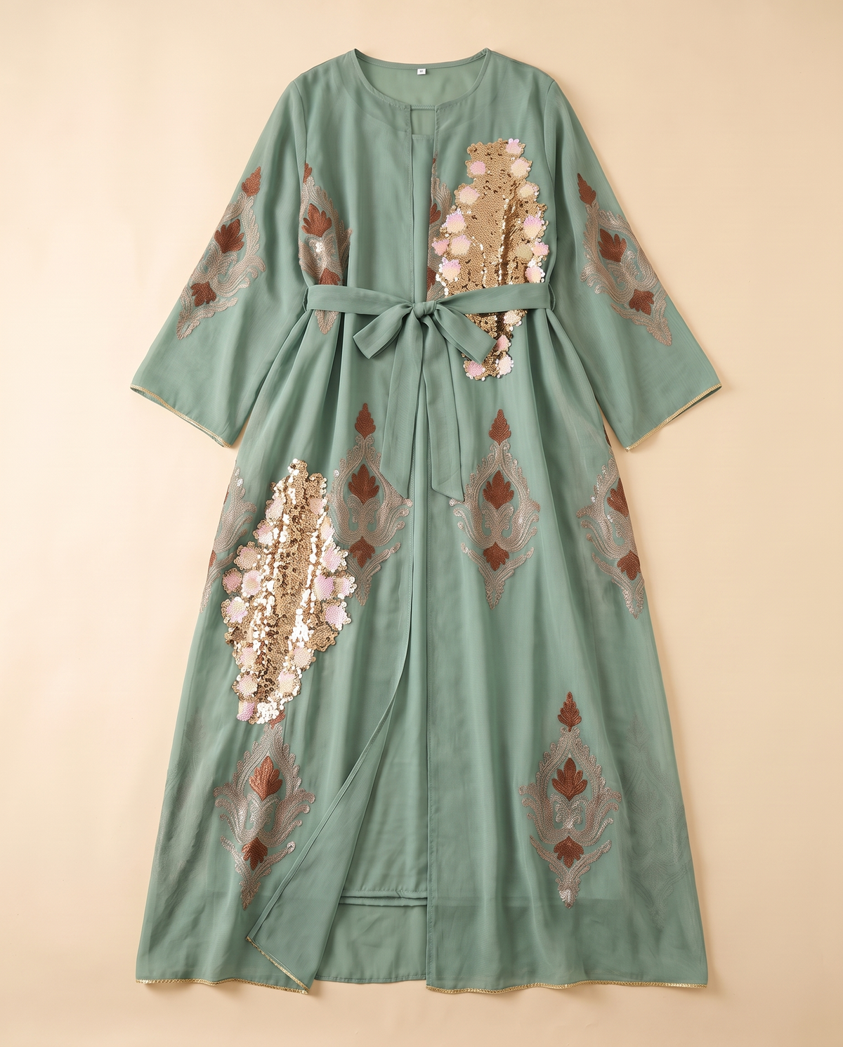 Zaina embroidered sequin kaftan in Sage, flat lay