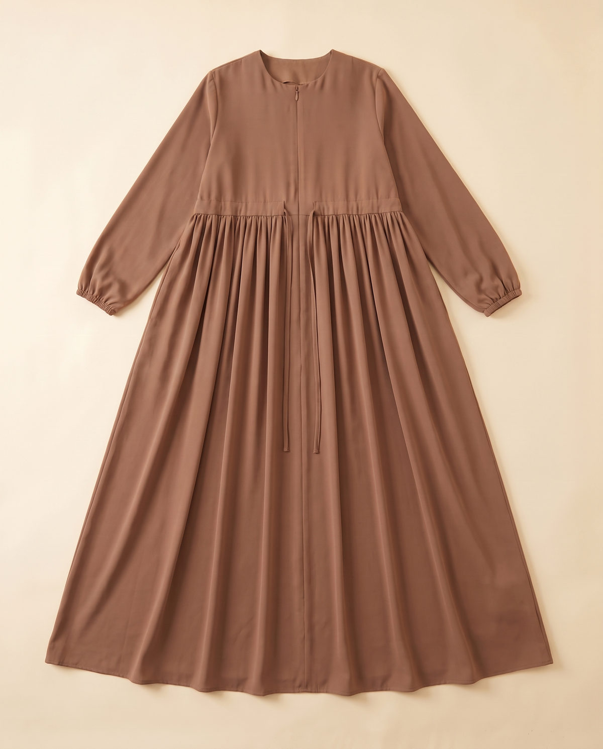 Zip-front swing abaya in Camel, flat lay