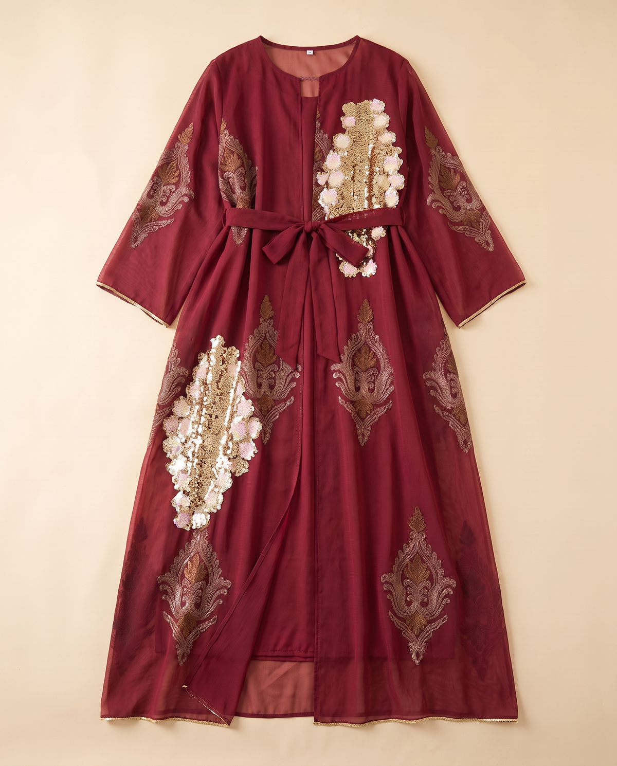 Zaina embroidered sequin kaftan in Wine Red, flat lay