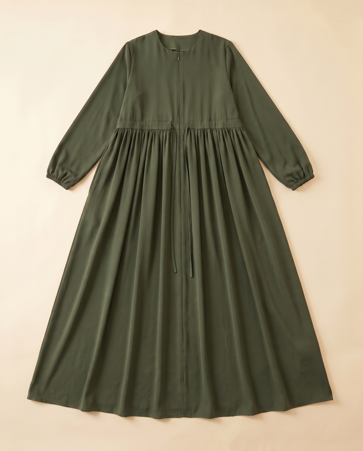 Zip-front swing abaya in Olive, flat lay